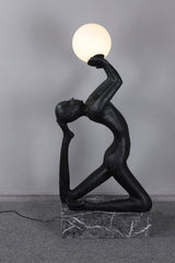 modern-artistic-human-figure-floor-lamp-with-luminous-glass-globe-sphere