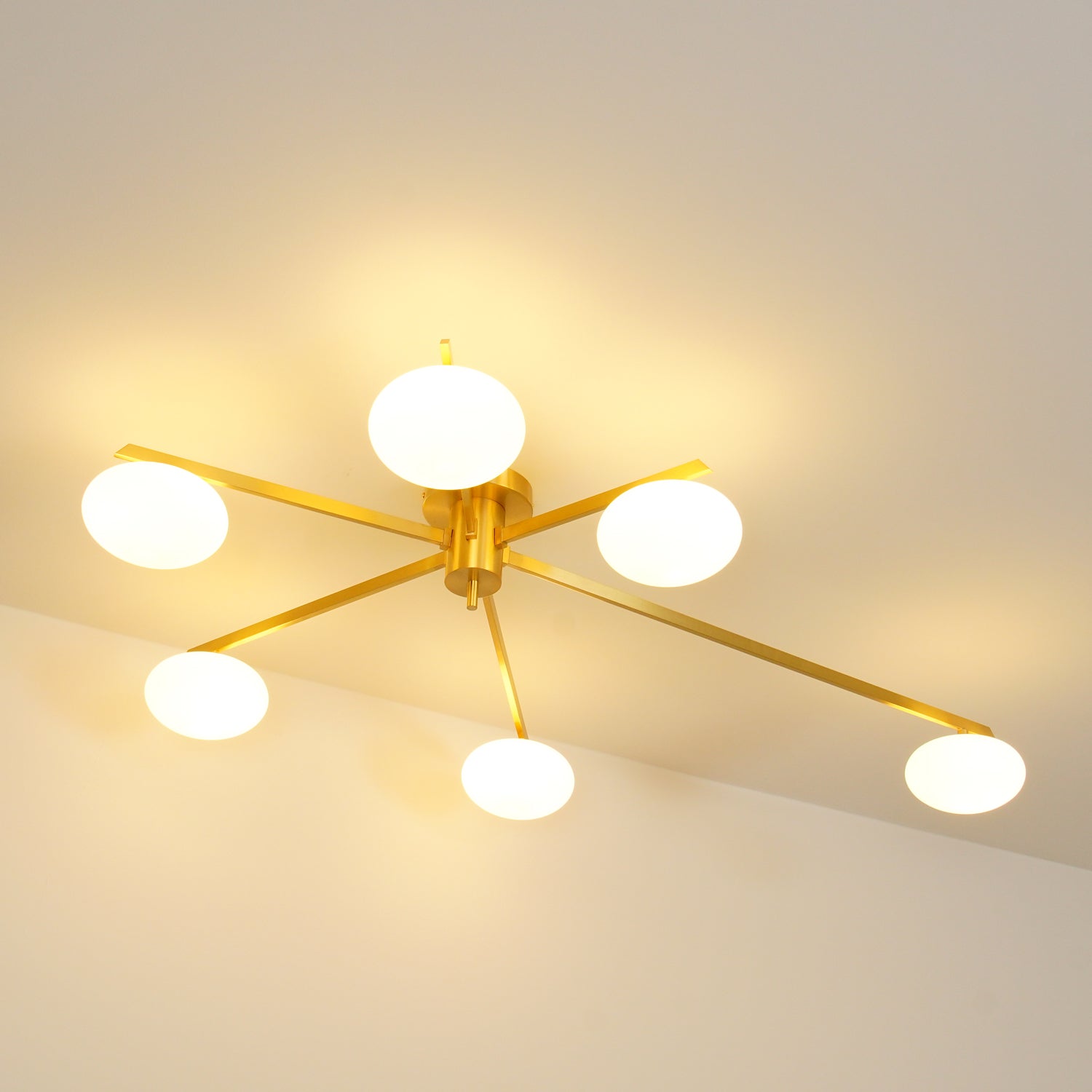 modern-jasper-glass-globe-ceiling-light-with-minimalist-metal-arms-and-oval-bulbs