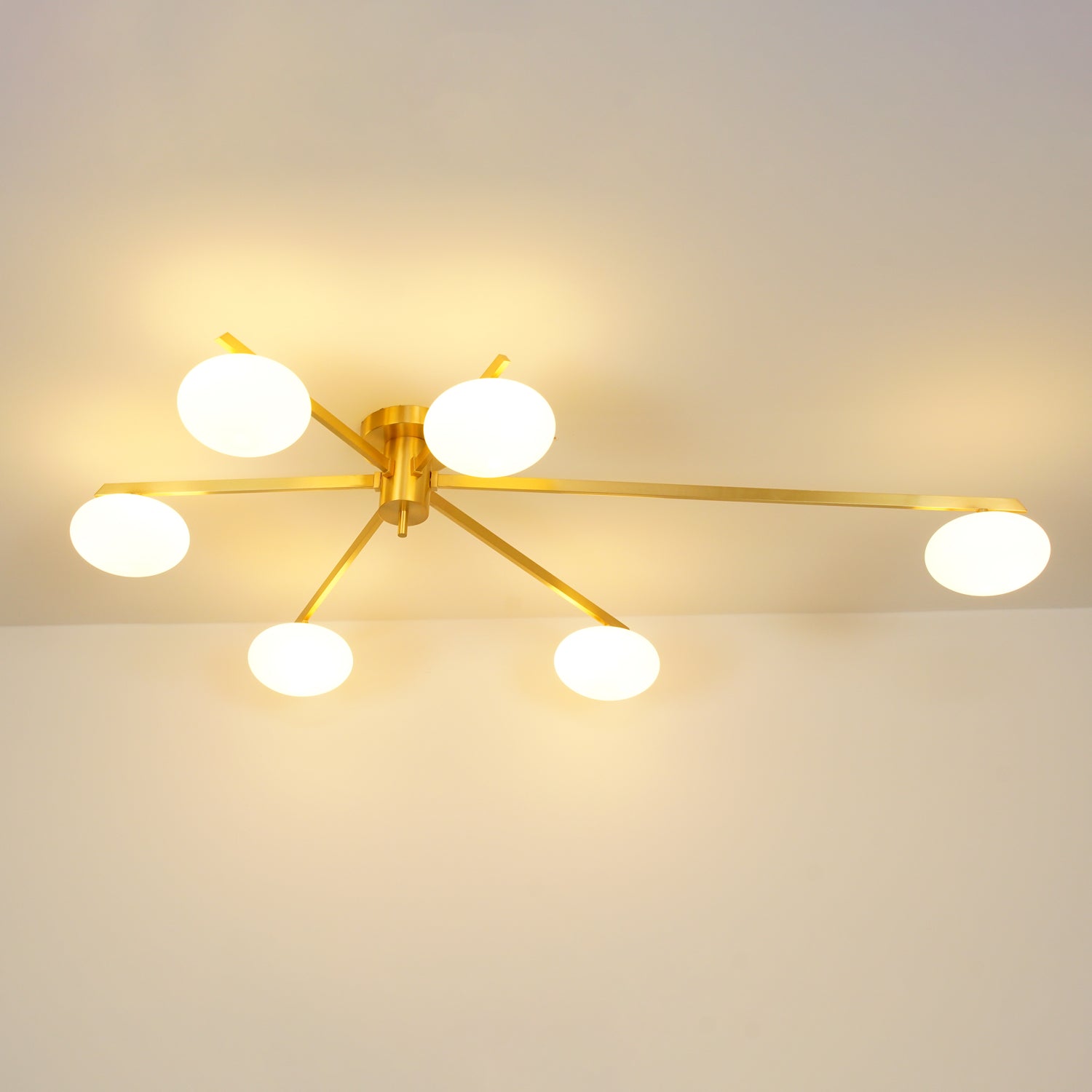 modern-jasper-glass-globe-ceiling-light-with-minimalist-metal-arms-and-oval-bulbs