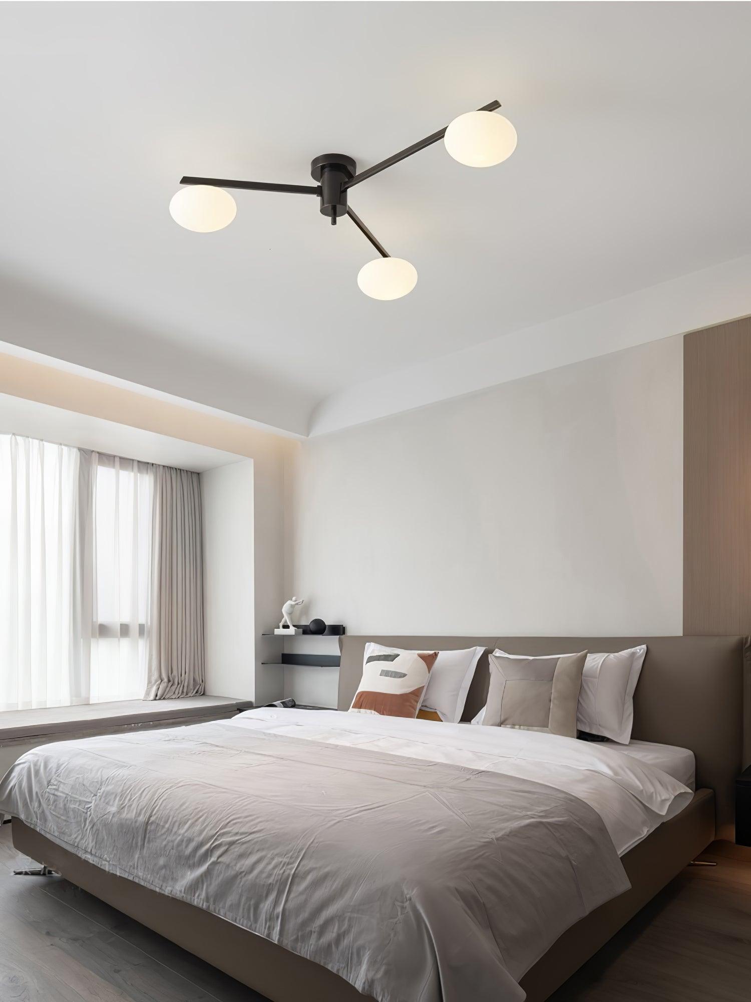 modern-jasper-glass-globe-ceiling-light-with-minimalist-metal-arms-and-oval-bulbs