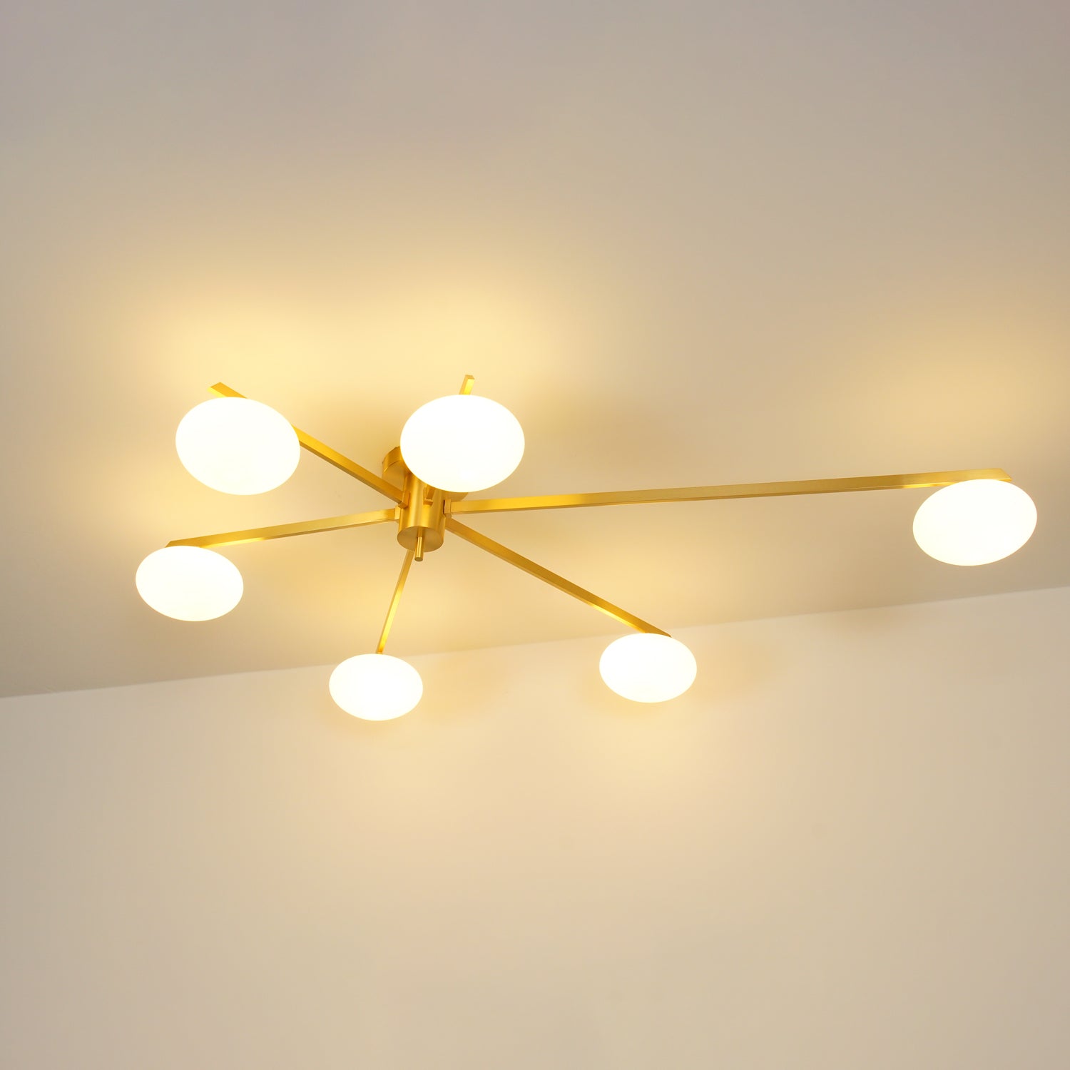 modern-jasper-glass-globe-ceiling-light-with-minimalist-metal-arms-and-oval-bulbs