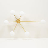 modern-jasper-glass-globe-ceiling-light-with-minimalist-metal-arms-and-oval-bulbs