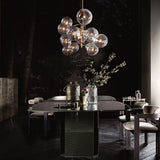 modern-glass-bubble-chandelier-with-burnished-brass-finish-and-led-integrated-lighting