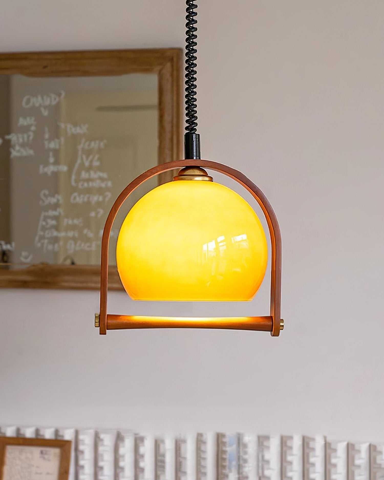 modern-vintage-glass-globe-pendant-lamp-with-adjustable-height-and-transparent-brown-shade