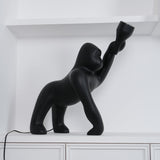 Modern Kong Figurative Monkey Floor Lamp with Adjustable Arm and Matte Black Finish