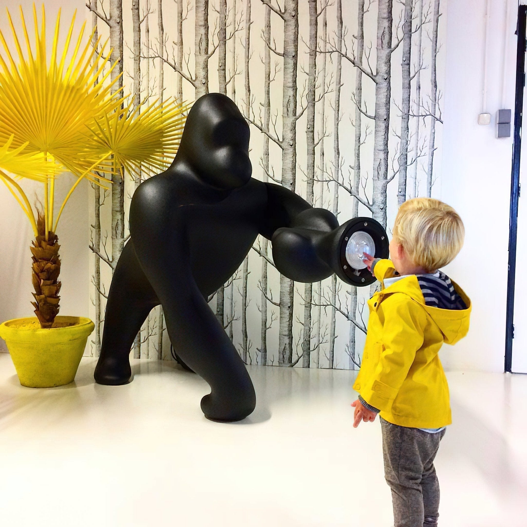 Modern Kong Figurative Monkey Floor Lamp with Adjustable Arm and Matte Black Finish