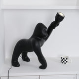 Modern Kong Figurative Monkey Floor Lamp with Adjustable Arm and Matte Black Finish