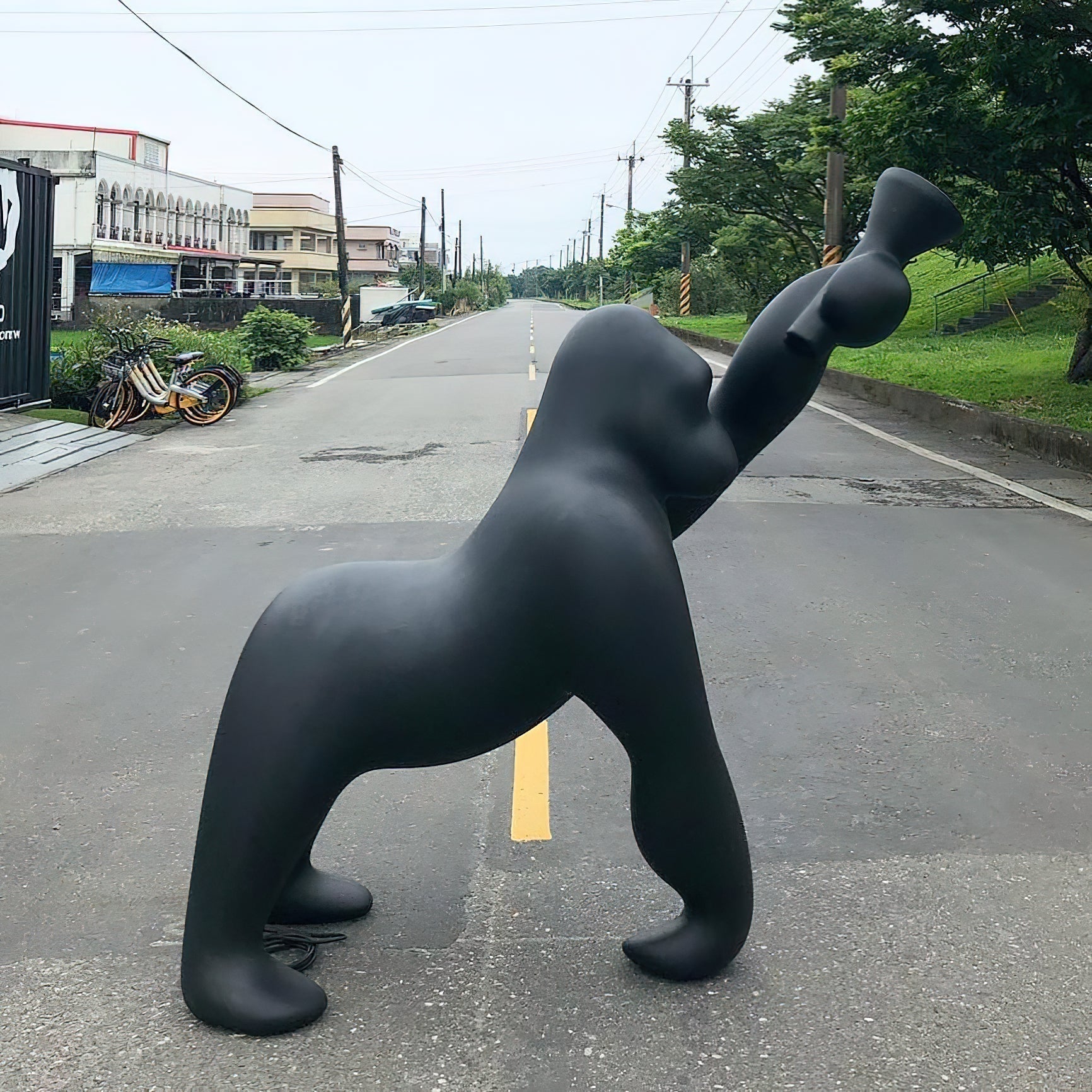 Modern Kong Figurative Monkey Floor Lamp with Adjustable Arm and Matte Black Finish