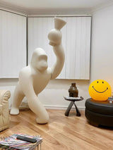 Modern Kong Figurative Monkey Floor Lamp with Adjustable Arm and Matte Black Finish