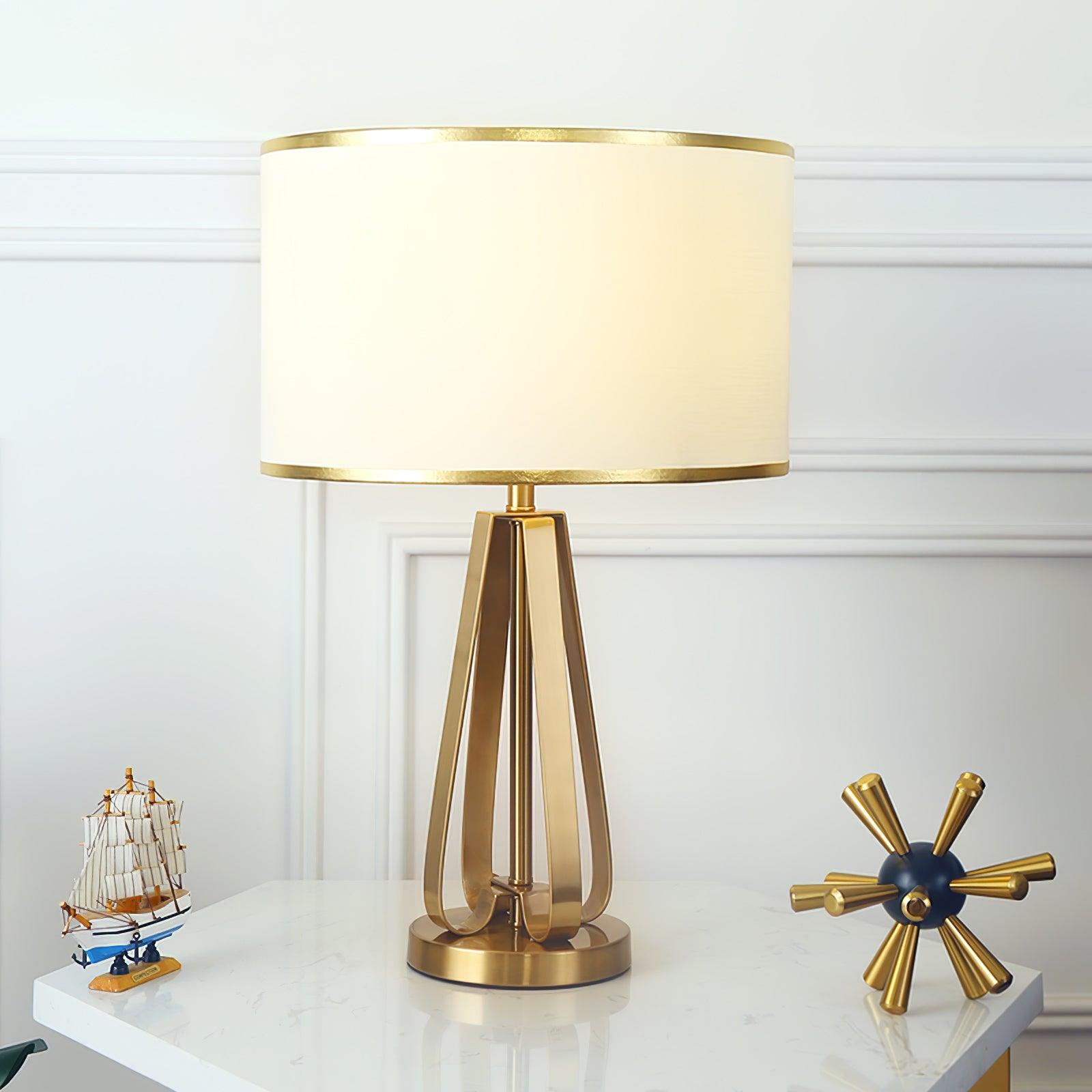 Laila Antique Gold Table Lamp with Ivory Fabric Shade and Curved Metal Base