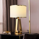 Laila Antique Gold Table Lamp with Ivory Fabric Shade and Curved Metal Base