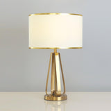Laila Antique Gold Table Lamp with Ivory Fabric Shade and Curved Metal Base