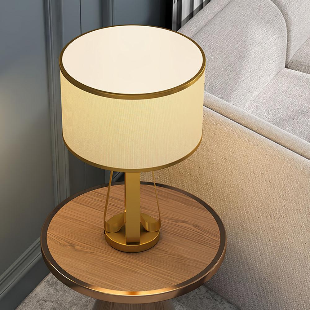 Laila Antique Gold Table Lamp with Ivory Fabric Shade and Curved Metal Base