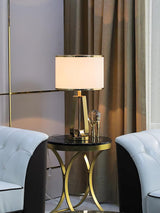Laila Antique Gold Table Lamp with Ivory Fabric Shade and Curved Metal Base
