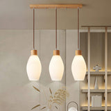 modern-rubber-wood-bottle-pendant-light-minimalist-glass-hanging-ceiling-fixture