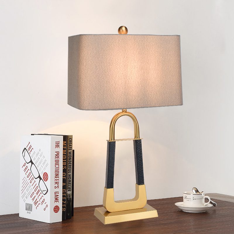 elegant-leather-texture-table-lamp-with-gold-metal-base-and-linen-shade