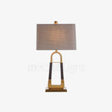 elegant-leather-texture-table-lamp-with-gold-metal-base-and-linen-shade