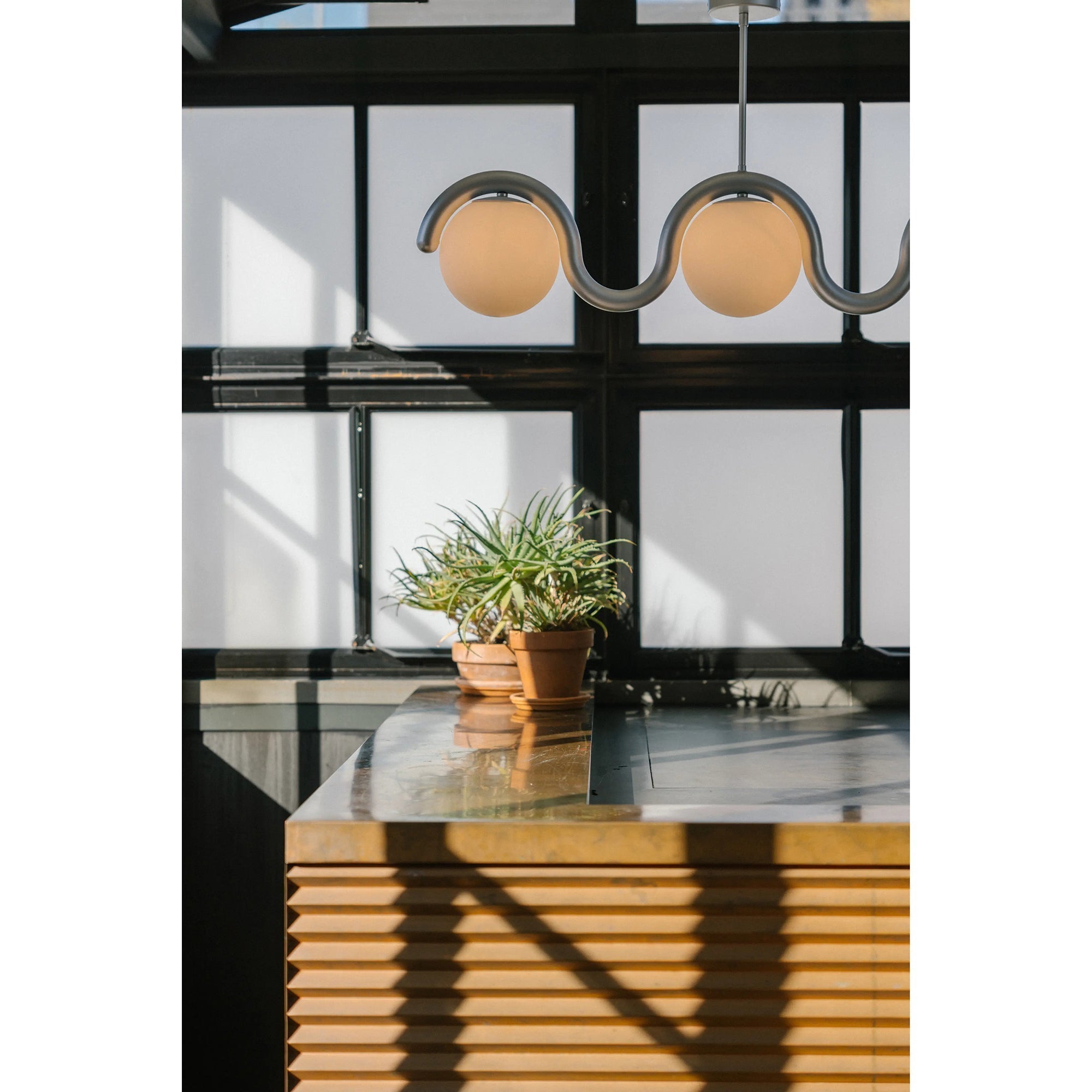 modern-art-nouveau-lenox-linear-brass-chandelier-for-kitchen-island