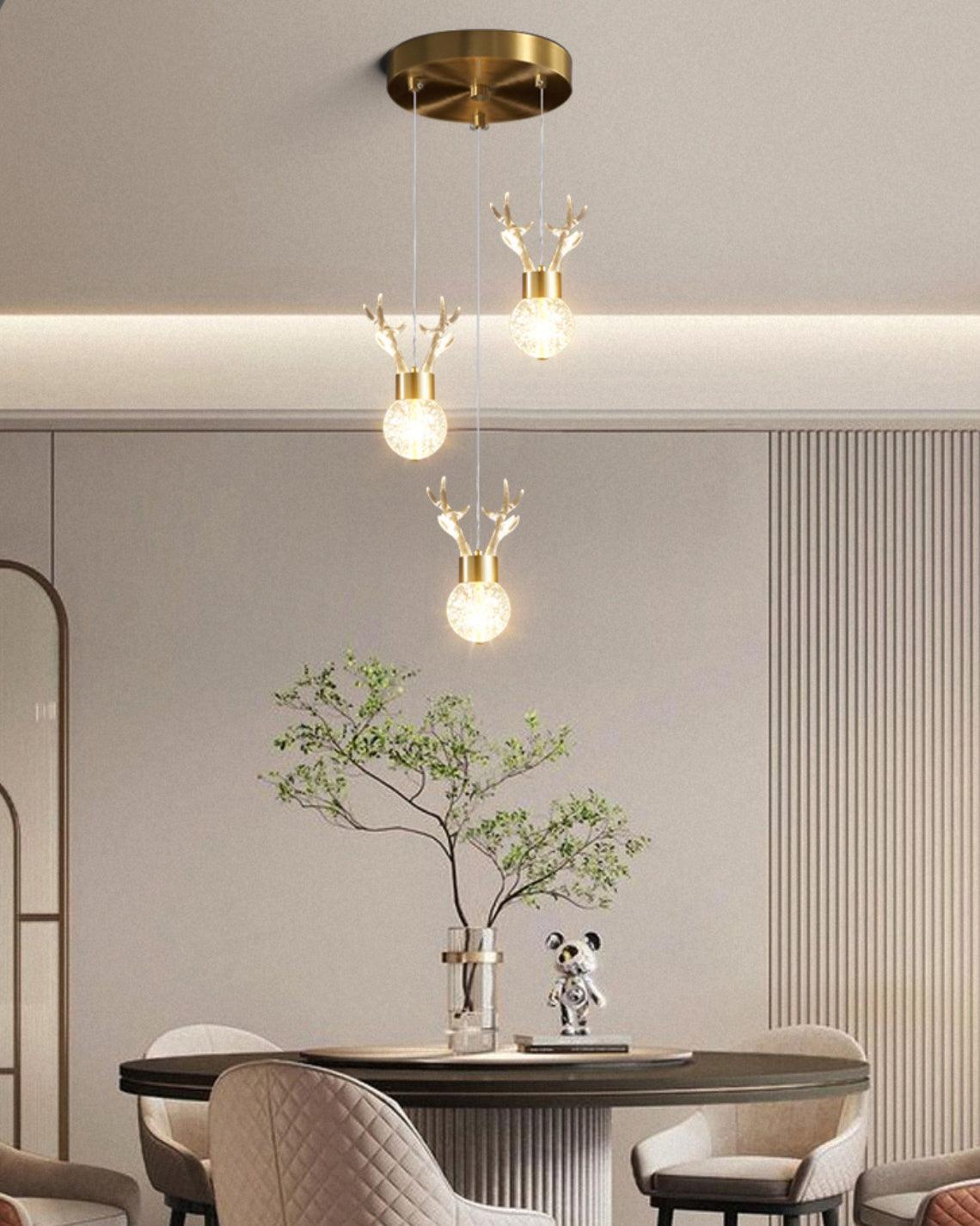 Modern Brass and Crystal Deer Pendant Light Whimsical LED Hanging Lamp for Bedroom