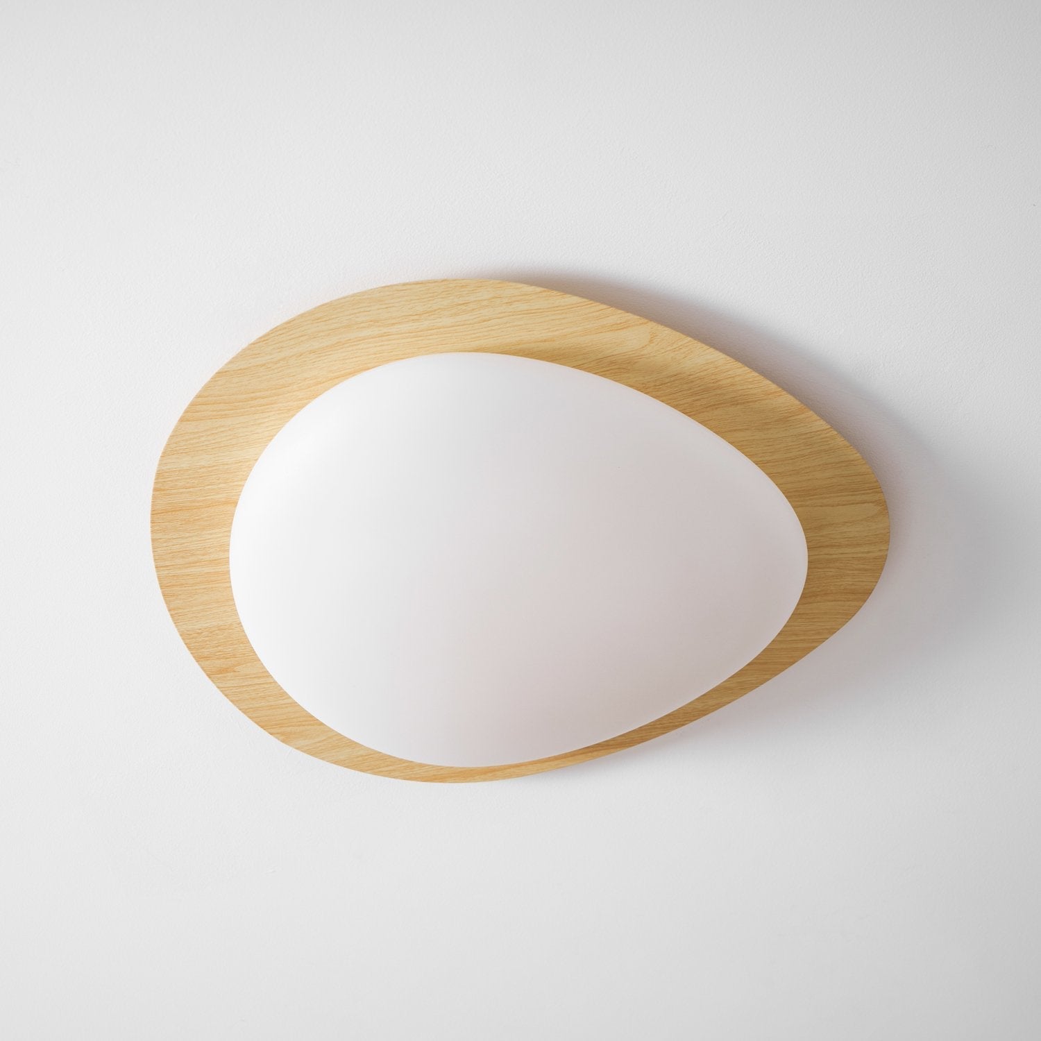 modern-pebble-shape-wood-grain-led-ceiling-light-for-contemporary-home-interiors