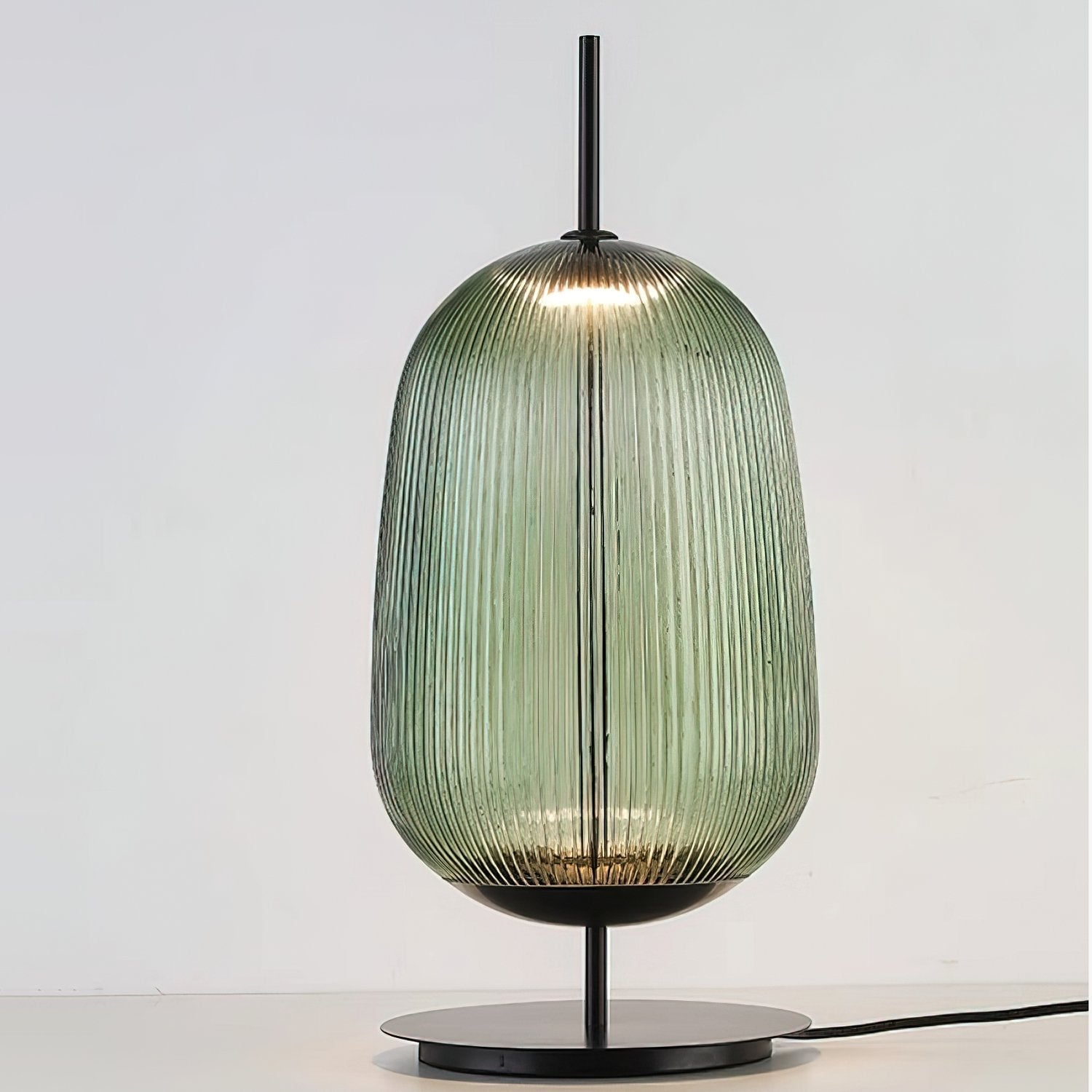 modern-ribbed-glass-table-lamp-with-minimalist-base-for-contemporary-living-spaces