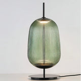 modern-ribbed-glass-table-lamp-with-minimalist-base-for-contemporary-living-spaces