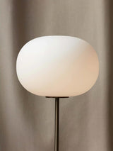 Modern Jwda Travertine Floor Lamp with Spherical Glass Globe and Yellow Stone Base