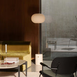 Modern Jwda Travertine Floor Lamp with Spherical Glass Globe and Yellow Stone Base