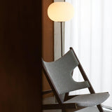 Modern Jwda Travertine Floor Lamp with Spherical Glass Globe and Yellow Stone Base