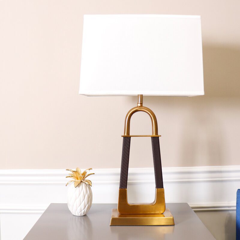 elegant-leather-texture-table-lamp-with-gold-metal-base-and-linen-shade