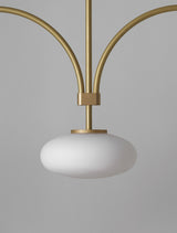 mid-century-modern-looping-brass-pendant-light-with-white-blown-glass-globes