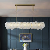 modern-brass-and-natural-white-alabaster-led-chandelier-for-luxury-dining-spaces