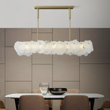 modern-brass-and-natural-white-alabaster-led-chandelier-for-luxury-dining-spaces