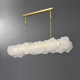modern-brass-and-natural-white-alabaster-led-chandelier-for-luxury-dining-spaces