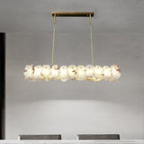 modern-brass-and-natural-white-alabaster-led-chandelier-for-luxury-dining-spaces