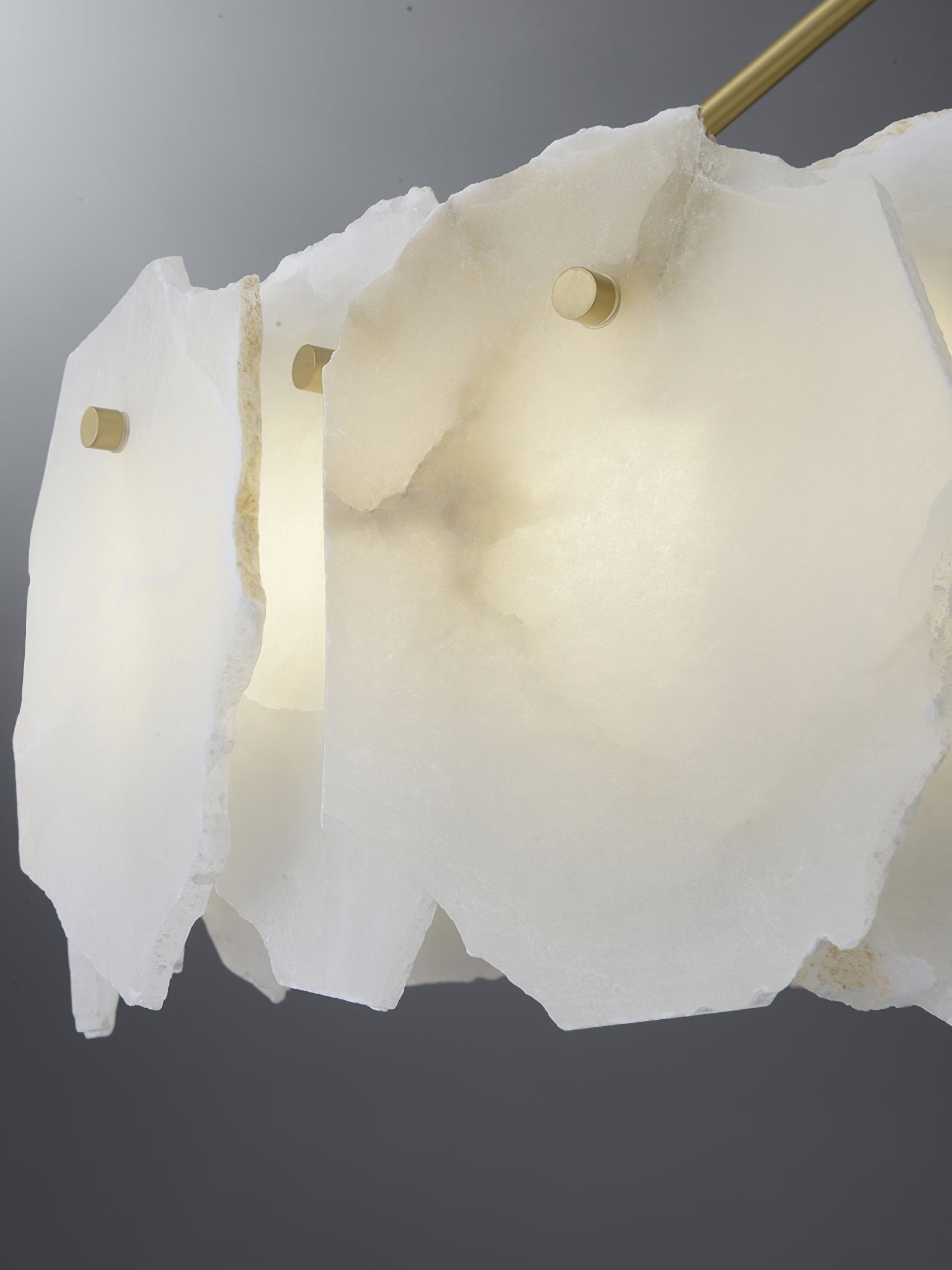 modern-brass-and-natural-white-alabaster-led-chandelier-for-luxury-dining-spaces