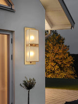 modern-brass-wall-sconce-lighting-with-elegant-handcrafted-glass-shade