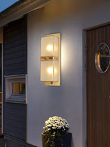 modern-brass-wall-sconce-lighting-with-elegant-handcrafted-glass-shade