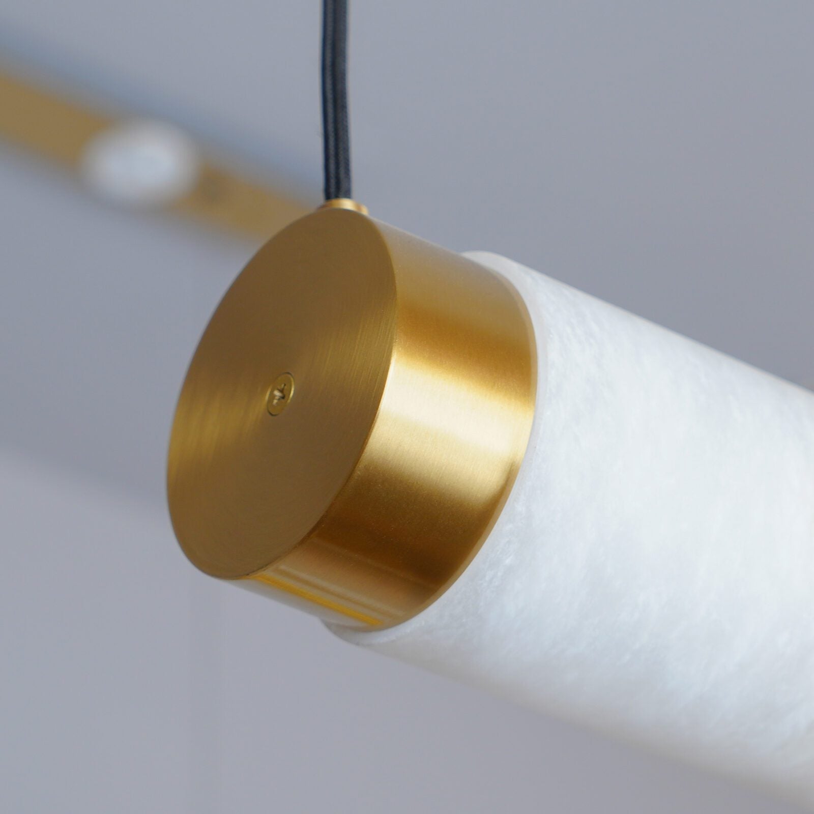 modern-natural-marble-strip-led-pendant-light-with-brass-accents-for-contemporary-interiors