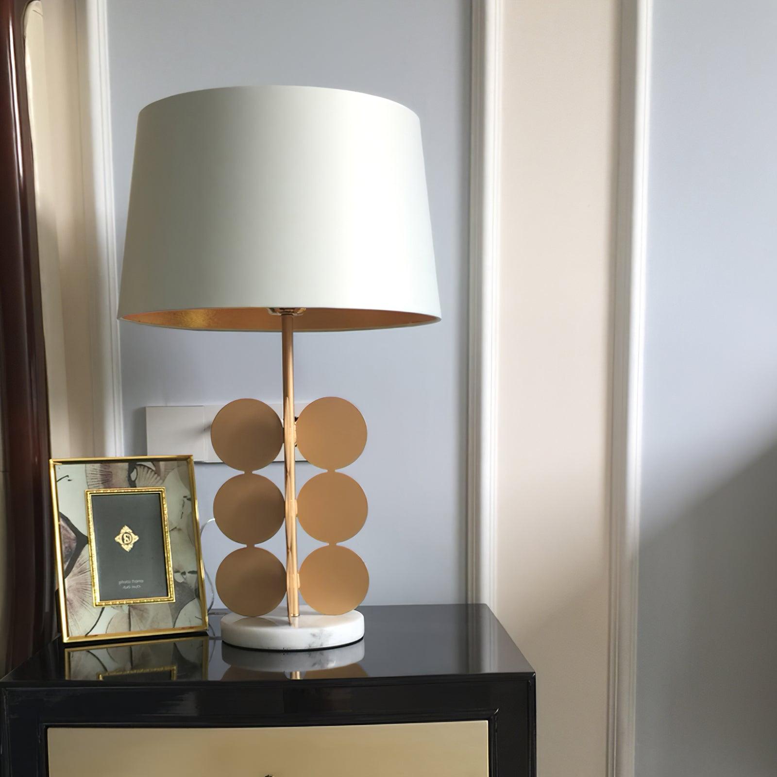 Sculptural Gold Metal Circle Table Lamp with Marble Base and White Fabric Shade for Modern Decor