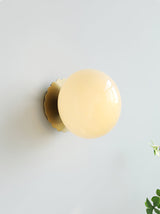 elegant-pink-glass-marshmallow-wall-sconce-for-modern-home-interior-lighting