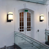waterproof-mcdade-outdoor-wall-sconce-with-creamy-white-glass-shade-and-black-iron-frame