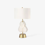 Modern Antique Gold Table Lamp with Clear Glass Leaf Accents and Fabric Drum Shade