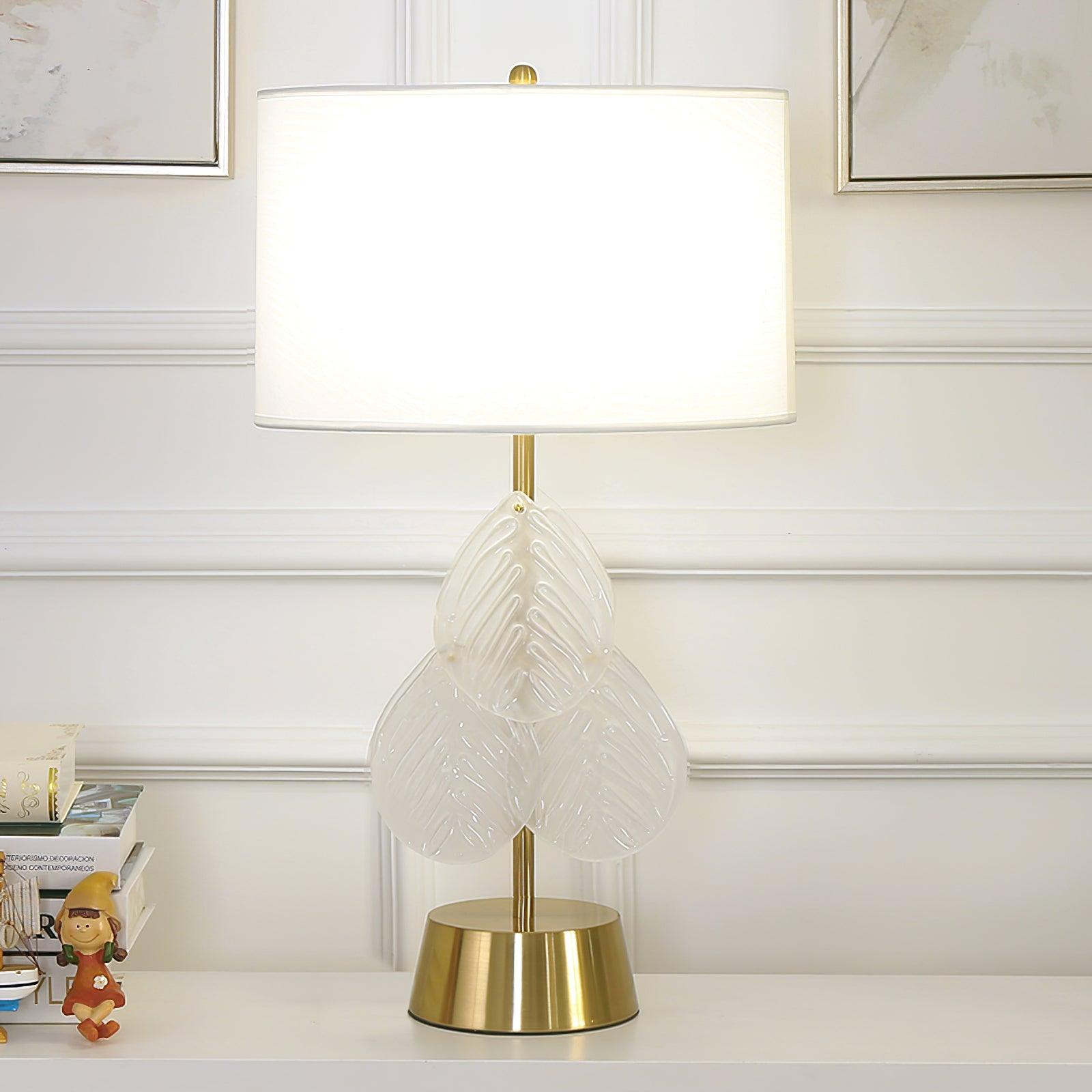 Modern Antique Gold Table Lamp with Clear Glass Leaf Accents and Fabric Drum Shade