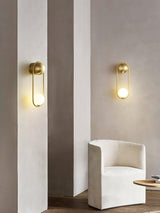 modern-mila-glass-globe-wall-sconce-brass-minimalist-interior-lighting-fixture