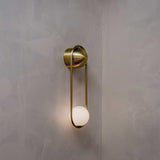 modern-mila-glass-globe-wall-sconce-brass-minimalist-interior-lighting-fixture