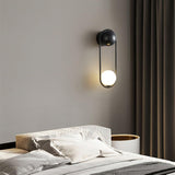 modern-mila-glass-globe-wall-sconce-brass-minimalist-interior-lighting-fixture