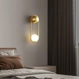 modern-mila-glass-globe-wall-sconce-brass-minimalist-interior-lighting-fixture