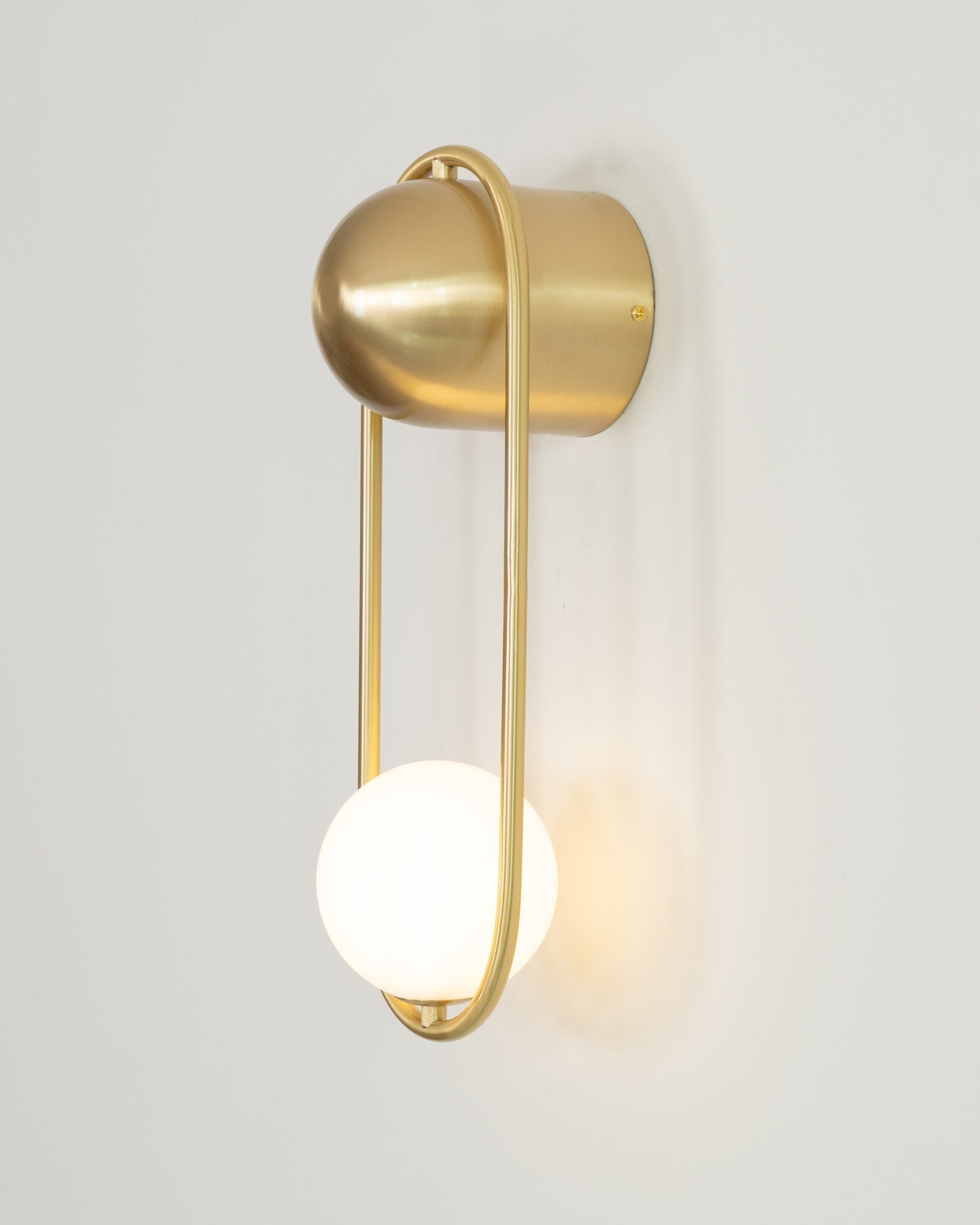 modern-mila-glass-globe-wall-sconce-brass-minimalist-interior-lighting-fixture
