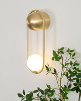 modern-mila-glass-globe-wall-sconce-brass-minimalist-interior-lighting-fixture